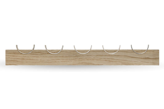 Wooden wall hook with five Brass hooks on a white background